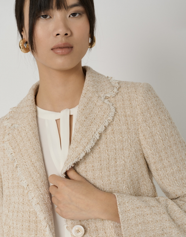 Cream-colored tweed short jacket with lapels