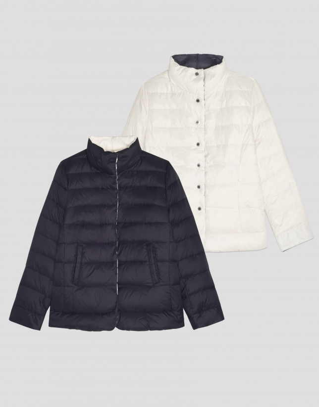 Navy blue and white reversible quilted windbreaker