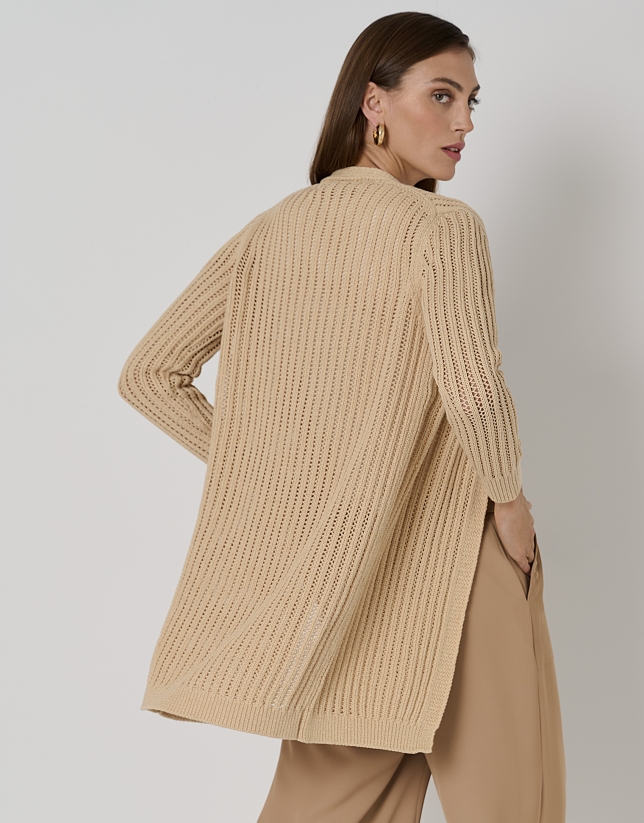 Long cream-colored ribbed knit jacket