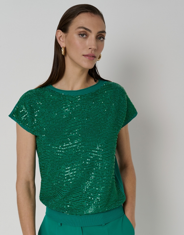 Green sweater with sequins