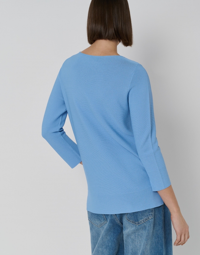 Blue light knit sweater with horizontal ribbing