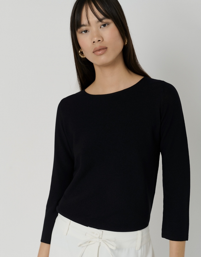 Black knit sweater with horizontal ribbing
