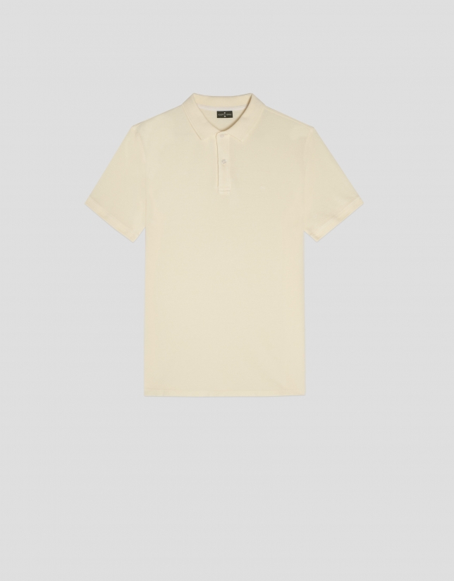 Dyed yellow piqué polo shirt with short sleeves