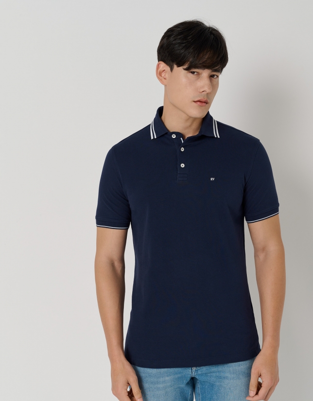 Navy blue piqué polo shirt with short sleeves