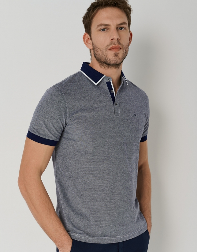 Blue two-color piqué polo shirt with short sleeves