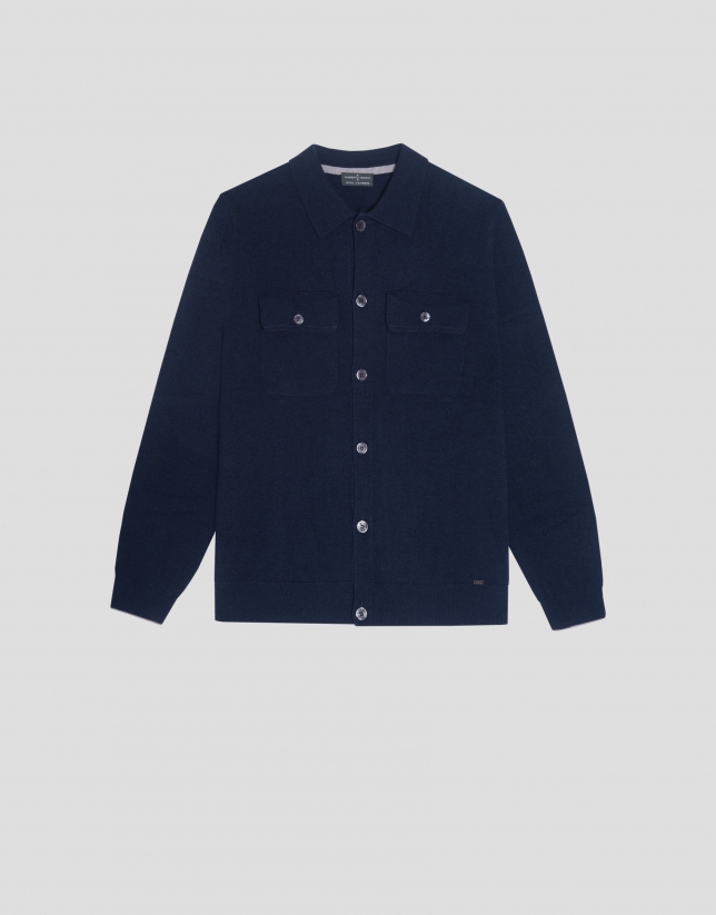 Navy blue jacket with chest pockets and buttons