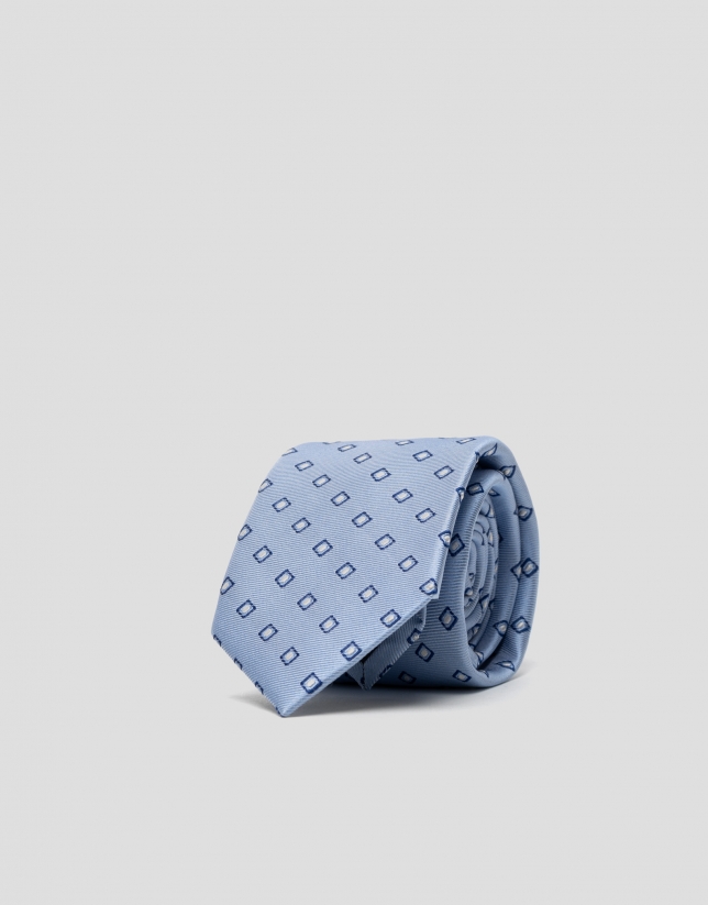 Light blue silk tie with ink blue and white jacquard print