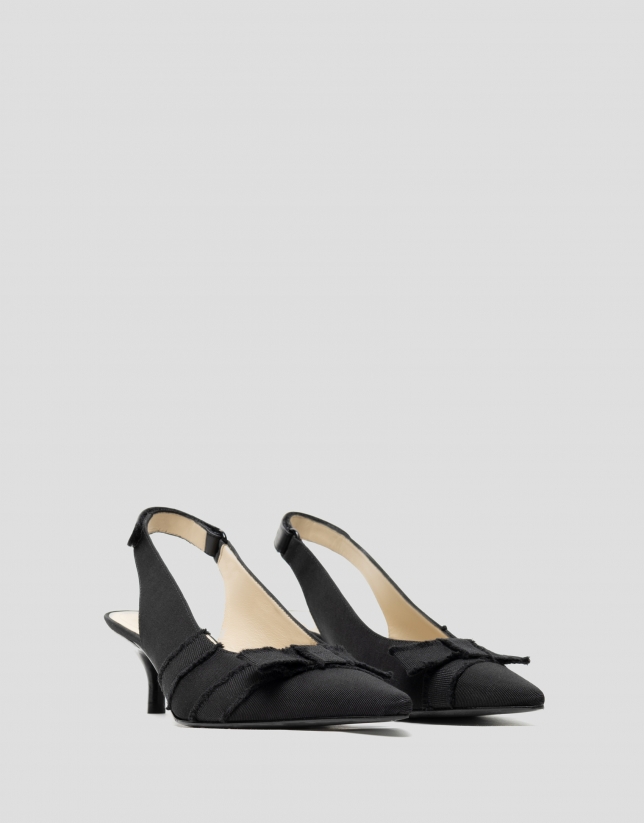 Black, sling-back pumps with frayed fabric